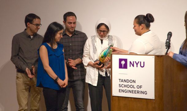 Sara-Lee Ramsawak, Assistant Director of Academic Affairs, presented Kalkhoran’s family with a commemorative plaque.