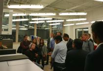 NYU Courant PhD Candidate Chelsea Tymms ('18) shows her research to the attendees of the symposium during the MakerSpace Tour.