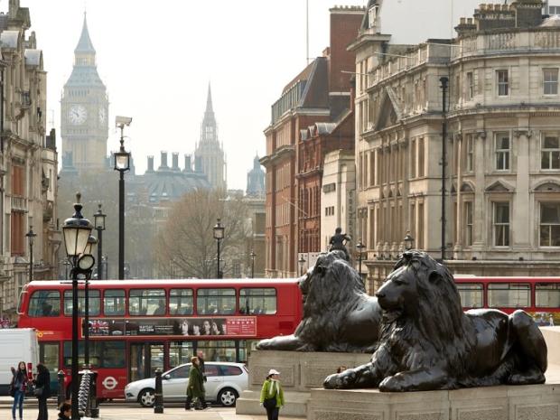 London city scene with red double decker bus