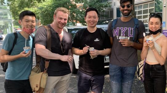 students enjoying ice cream during graduate orientation