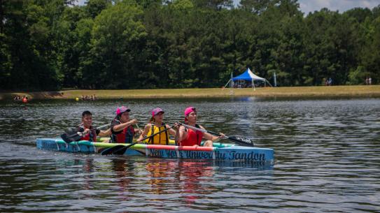 Team paddling on race day